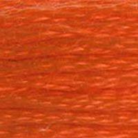 Close up of DMC stranded cotton shade 608 Pansy Orange